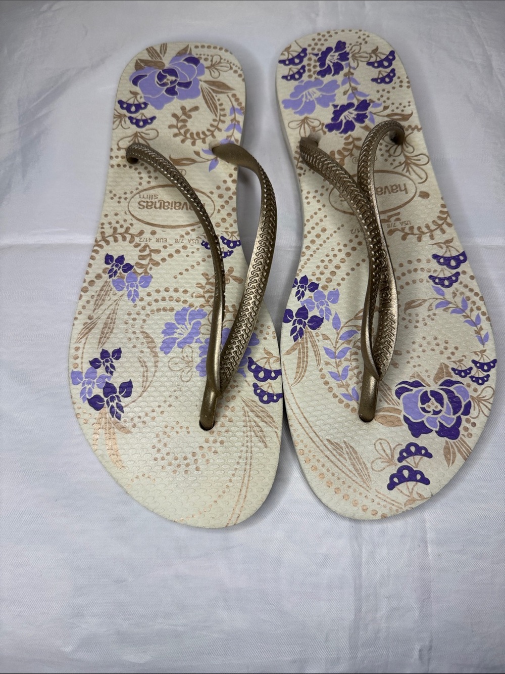 Havaianas Women’s Cream Flip Flops with Purple Floral Print and Bronze Straps